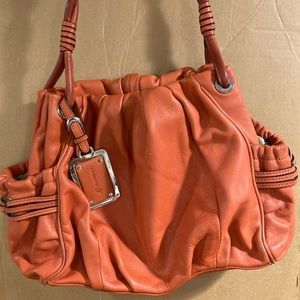 B. Makowsky Medium Orange Purse